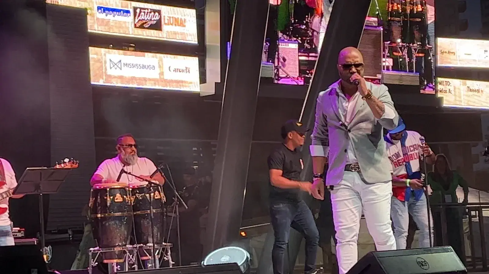 A singer and percussionists at the Latin Festival
