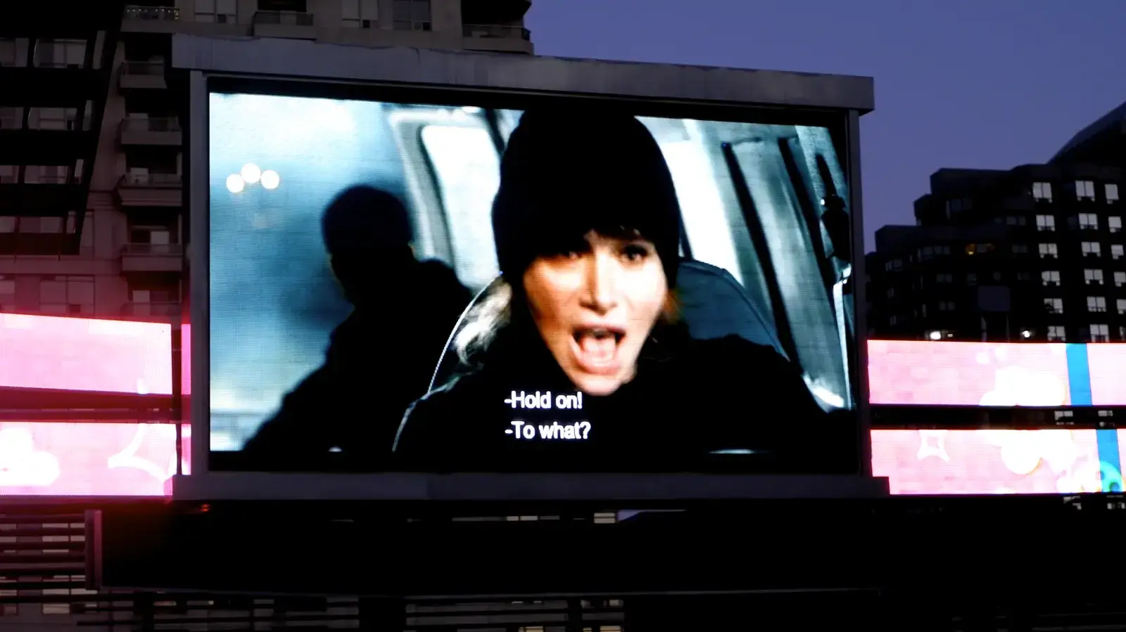 A film playing on the Square's big screen